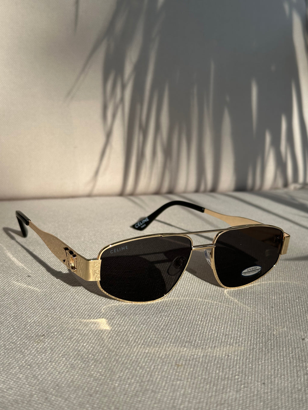 Zlatna sa crnim staklom 